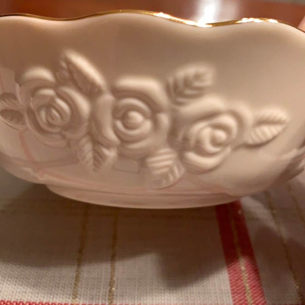 Vintage Lenox 5” bowl with embossed rose and gold trim around the top.